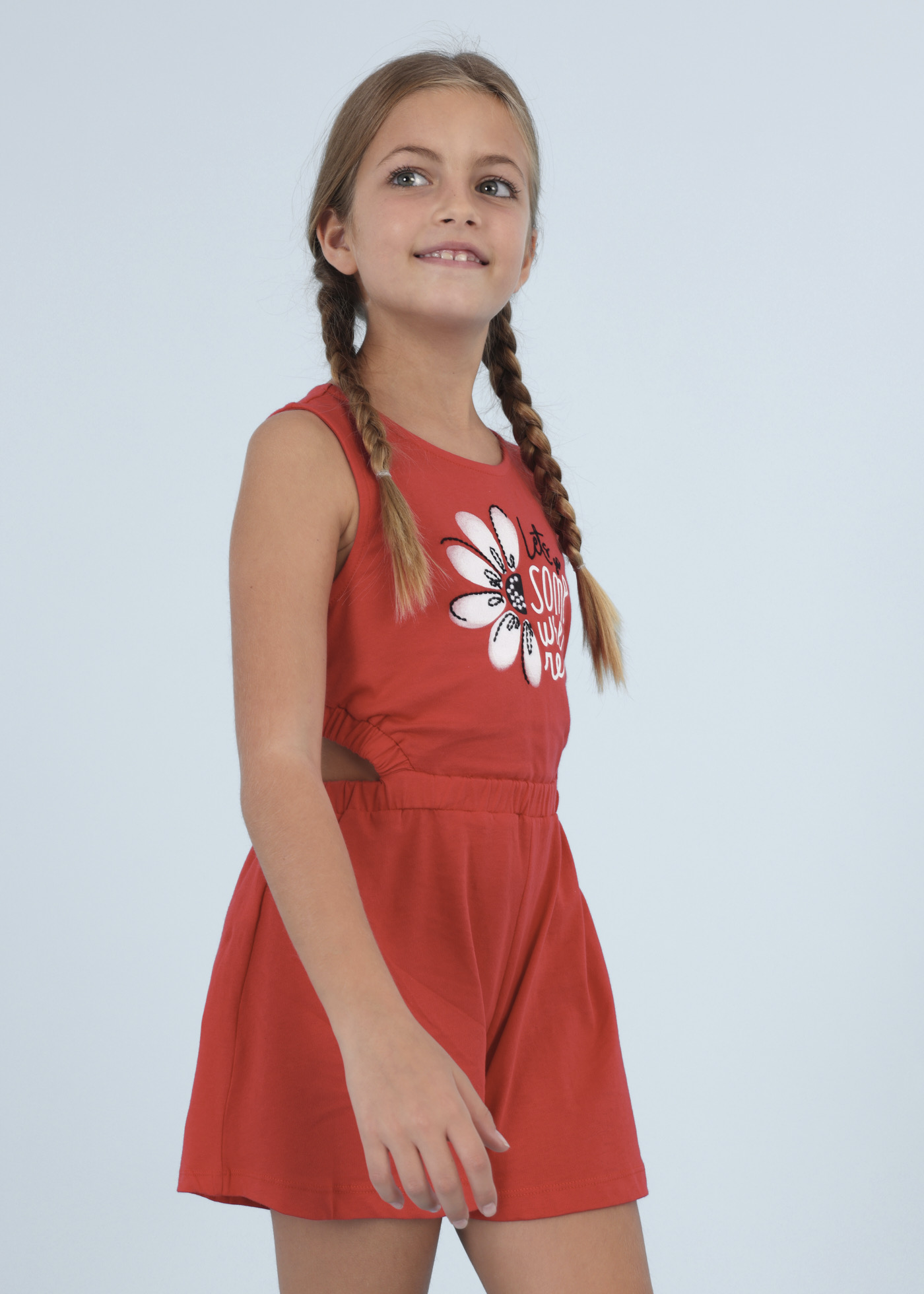 Macacão curto com estampa floral para menina