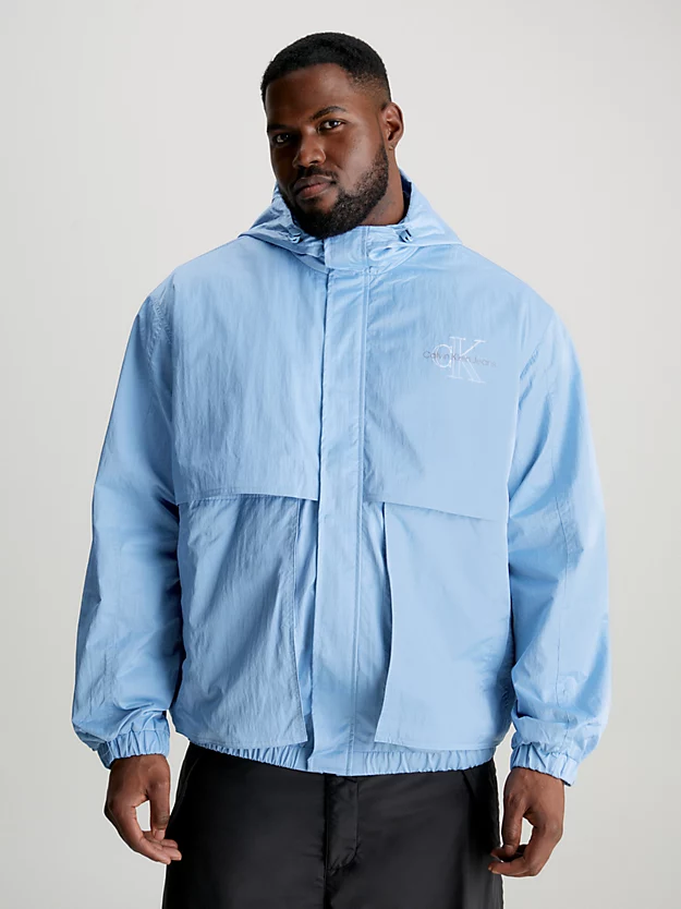 Jaqueta corta-vento com capuz oversized