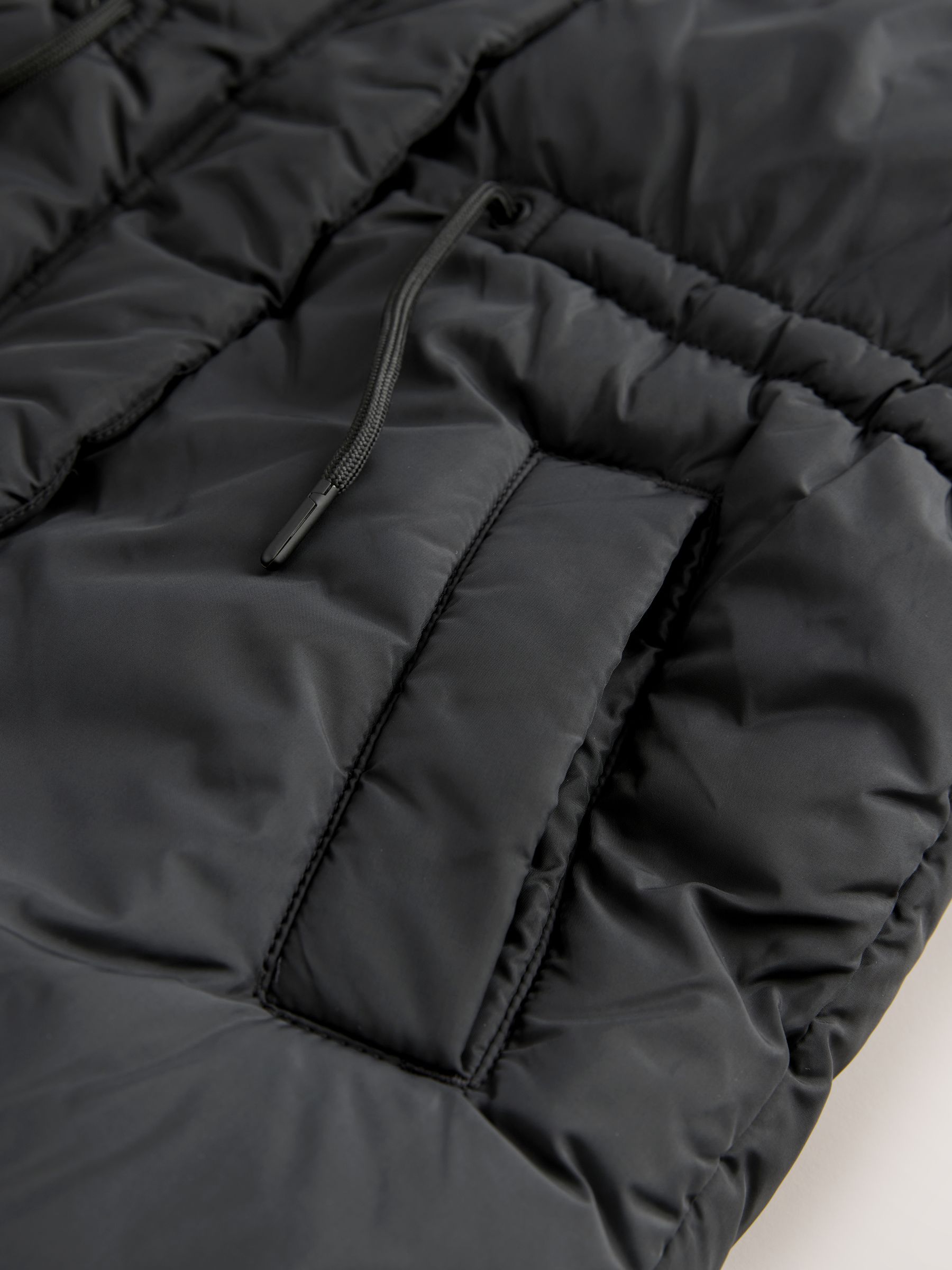 Zwart - Gewatteerde bodywarmer (3 - 16 jr)