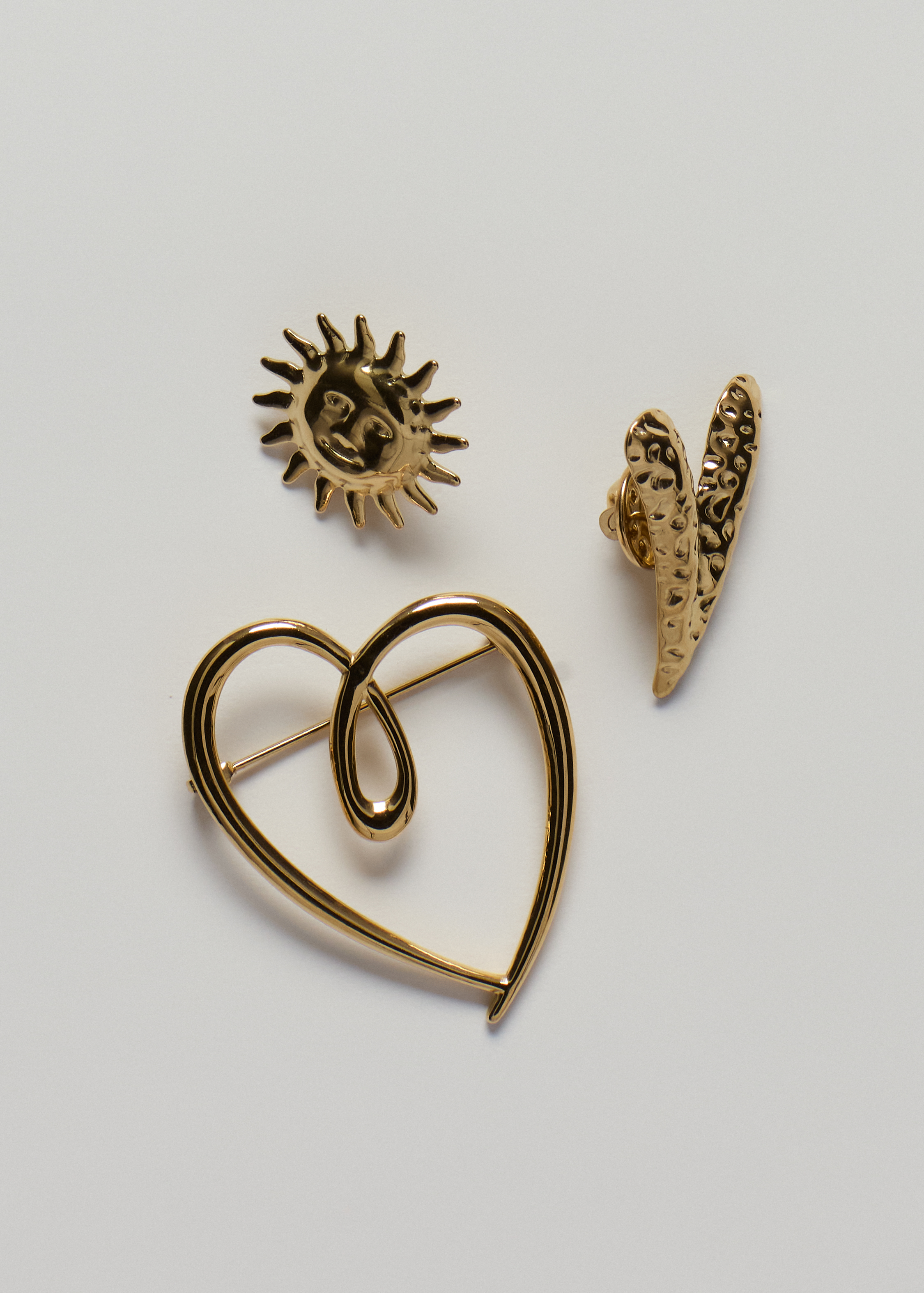 Set broches met hartjes en zon