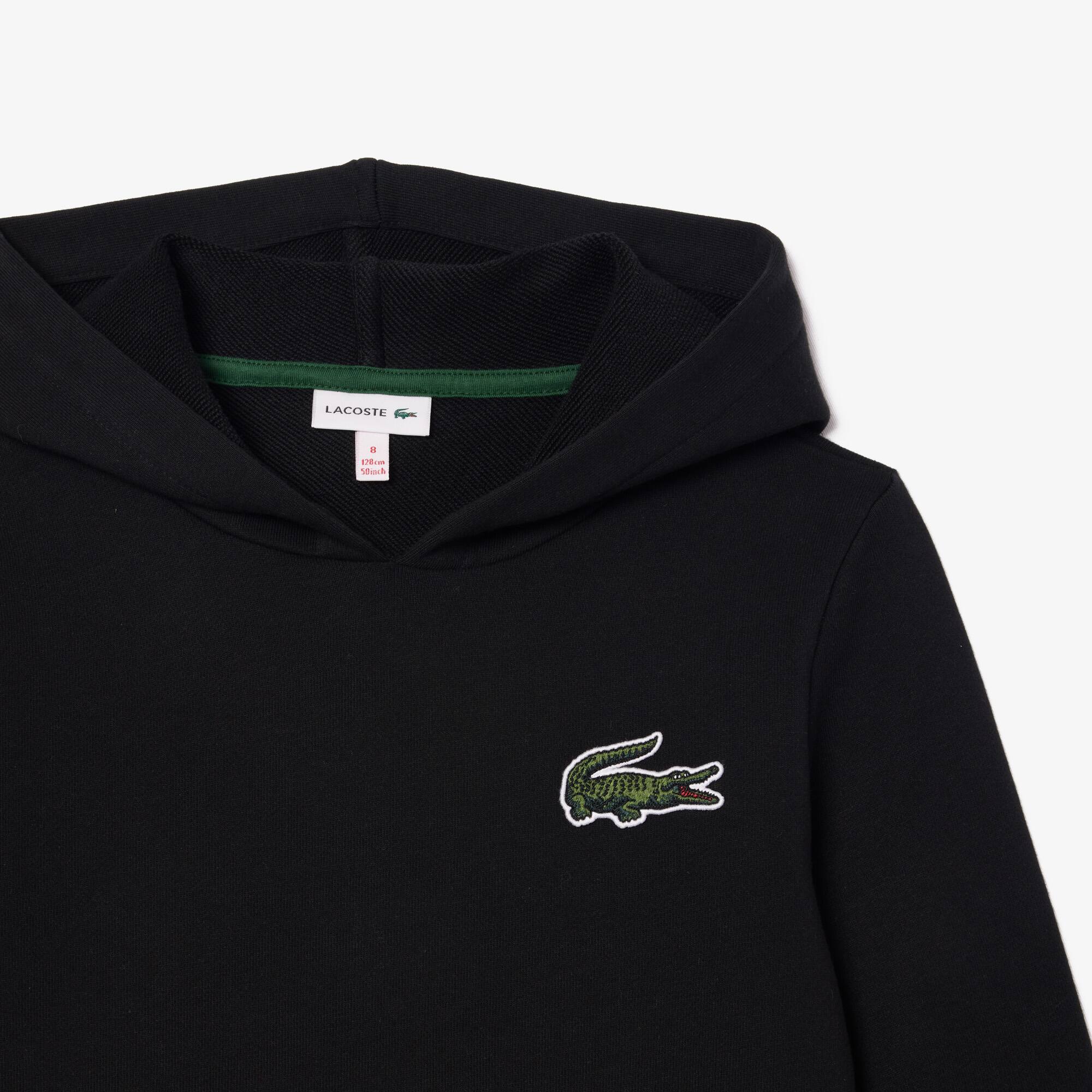 Robe sweatshirt à capuche en molleton de coton Pantalons & Robes - Noir - Lacoste - Fille