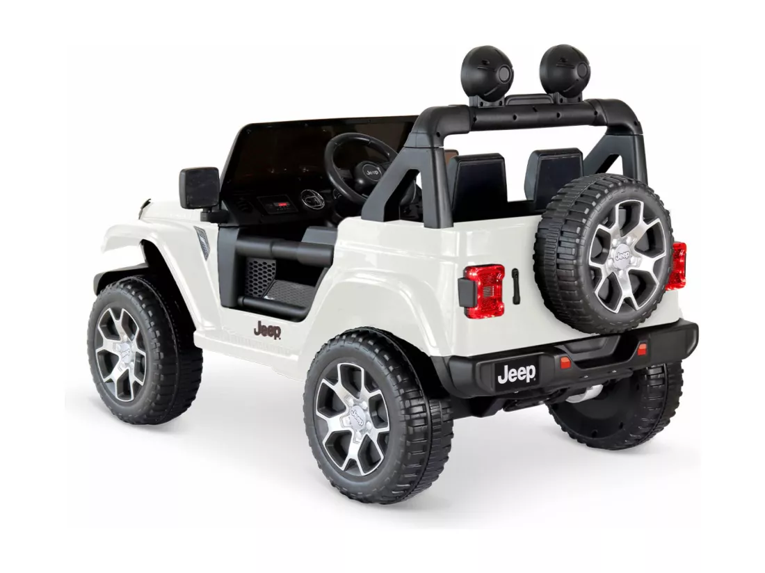 Voiture électrique 12V pour enfant - JEEP Wrangler Rubicon 2 roues motrices. blanche. 1 place. avec autoradio. télécommande. MP3. port USB / carte SD. prise jack et phares fonctionnels