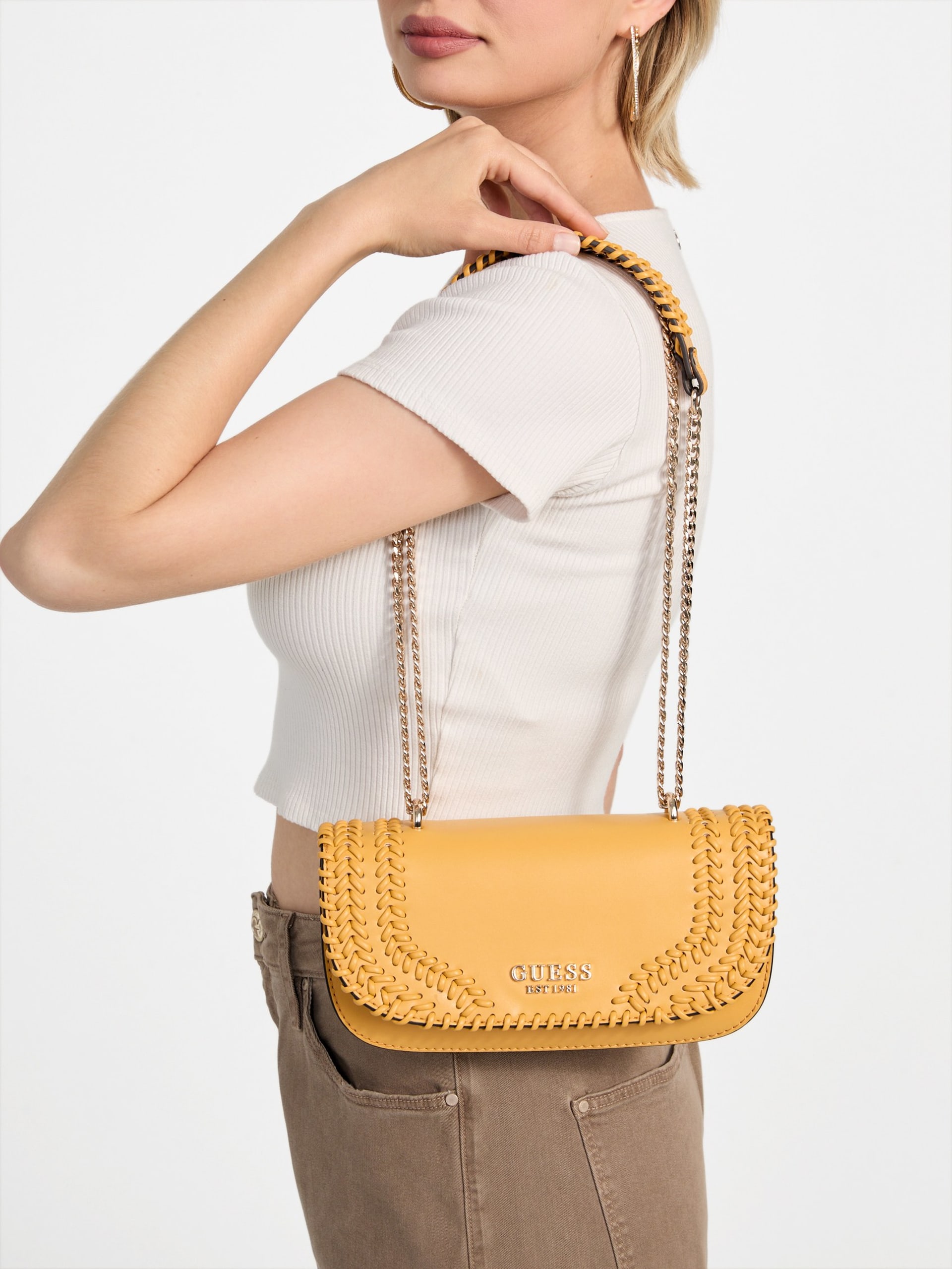 Bolsa transversal conversível Tatum com costura aparente