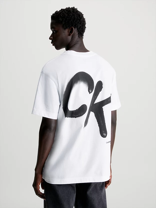Camiseta de modelagem relaxada com estampa e efeito spray.