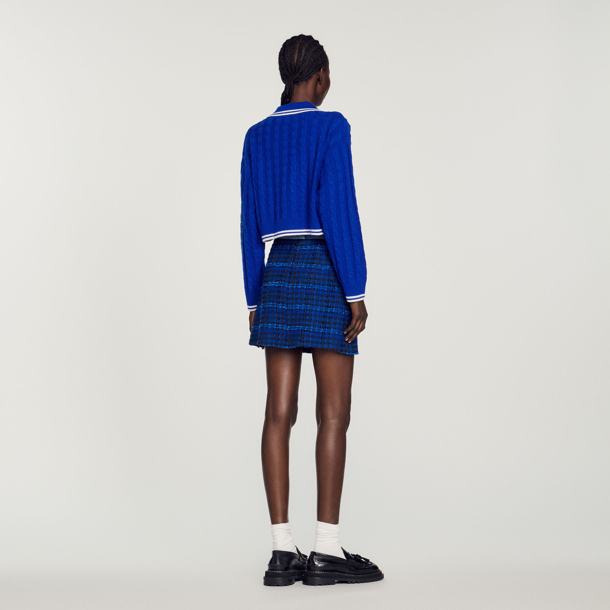 Pull court en maille torsadee