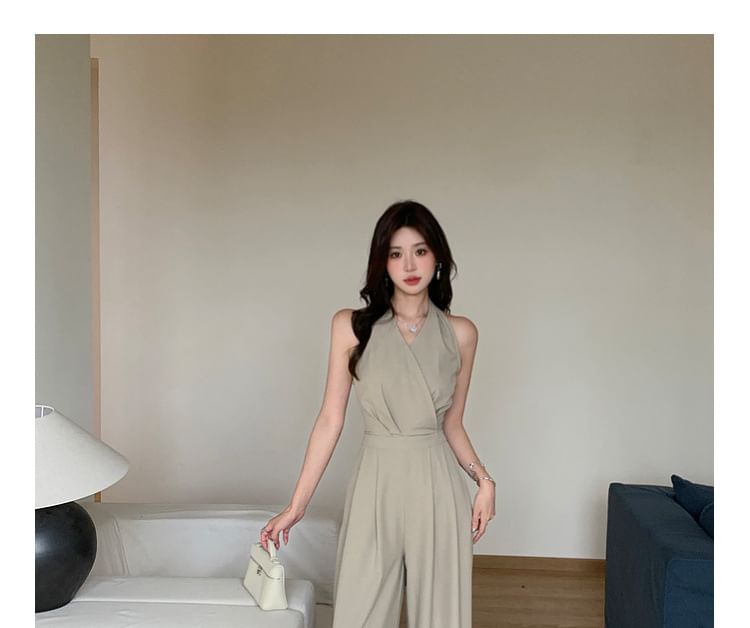 Yilda - Halter jumpsuit met wijde pijpen en wikkeldessin