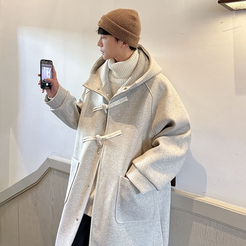 Orungeetun - Wollen trenchcoat met lange mouwen en tuimelschakelaar