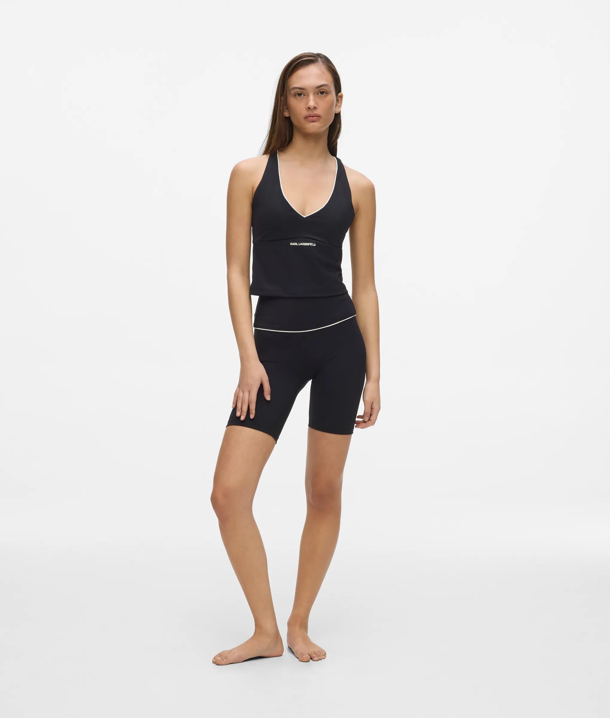 Athleisure korte broek met contrastbiesen