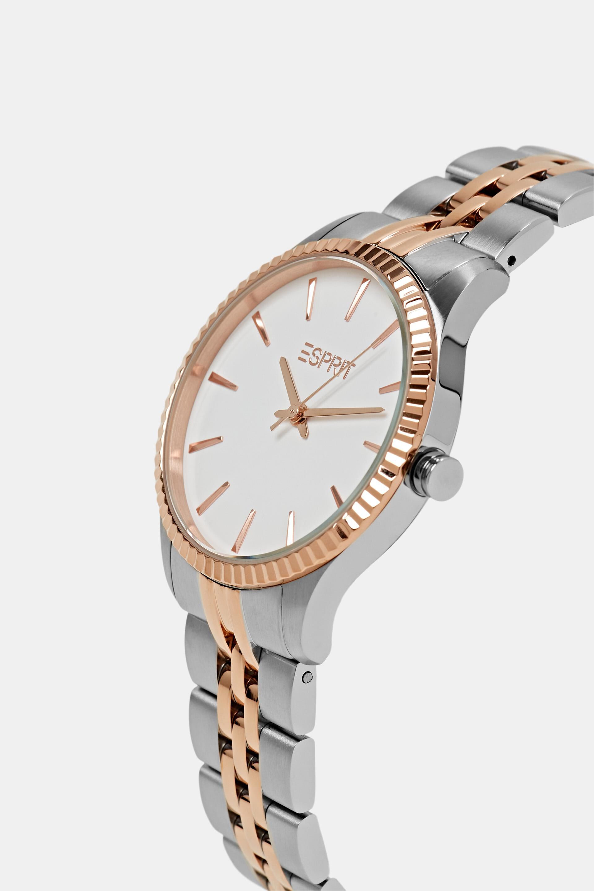 Montre bicolore à lunette ondulée