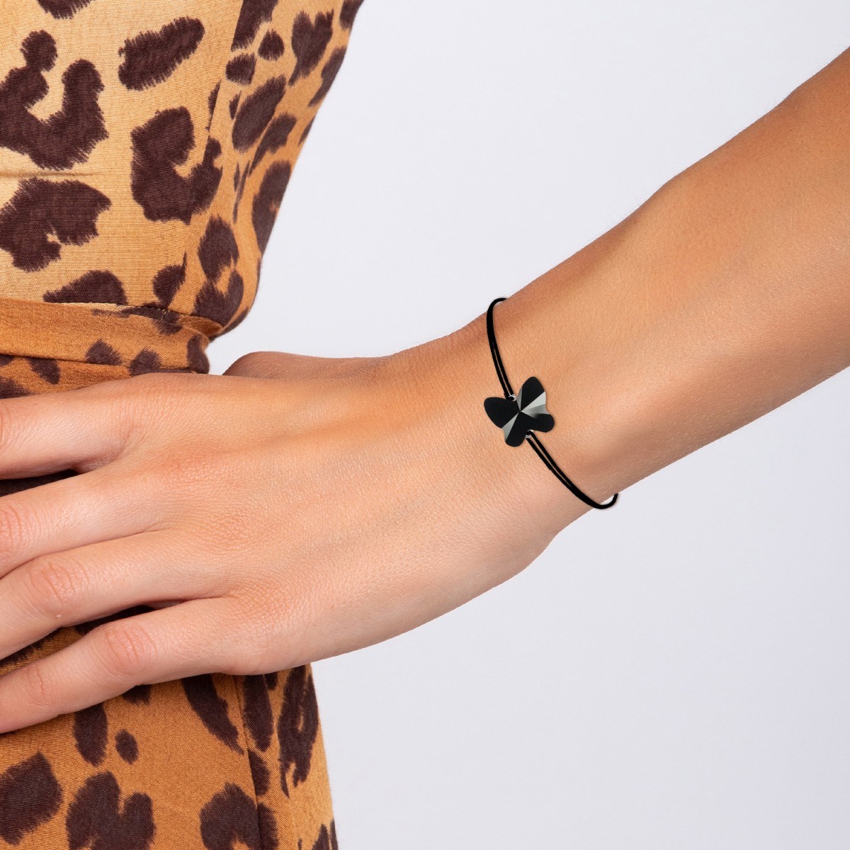 Bracelet papillon élastique noir SC Crystal orné d'un Cristal scintillant