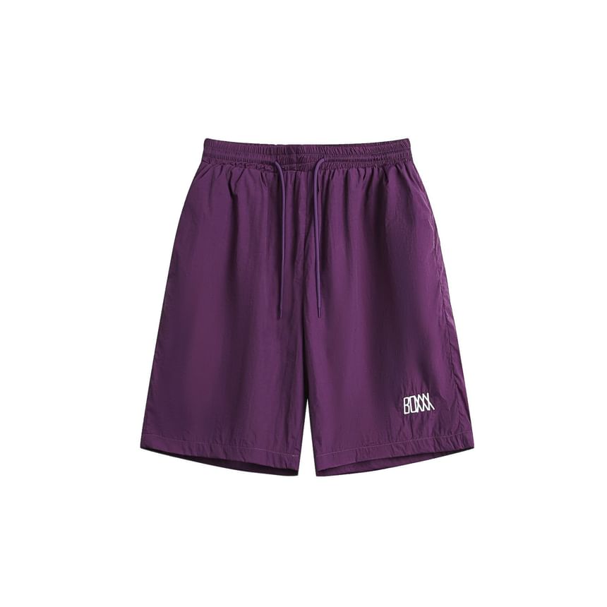 Hushgrain - Wijde shorts met hoge taille en letters