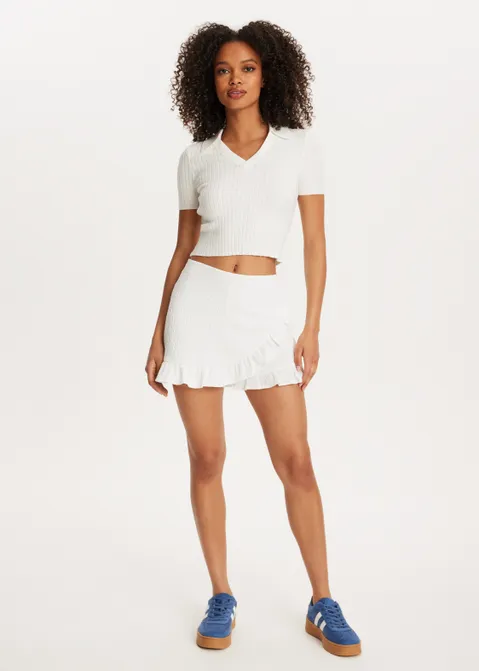 Polo trui met rib structuur off-white (WIT.O)