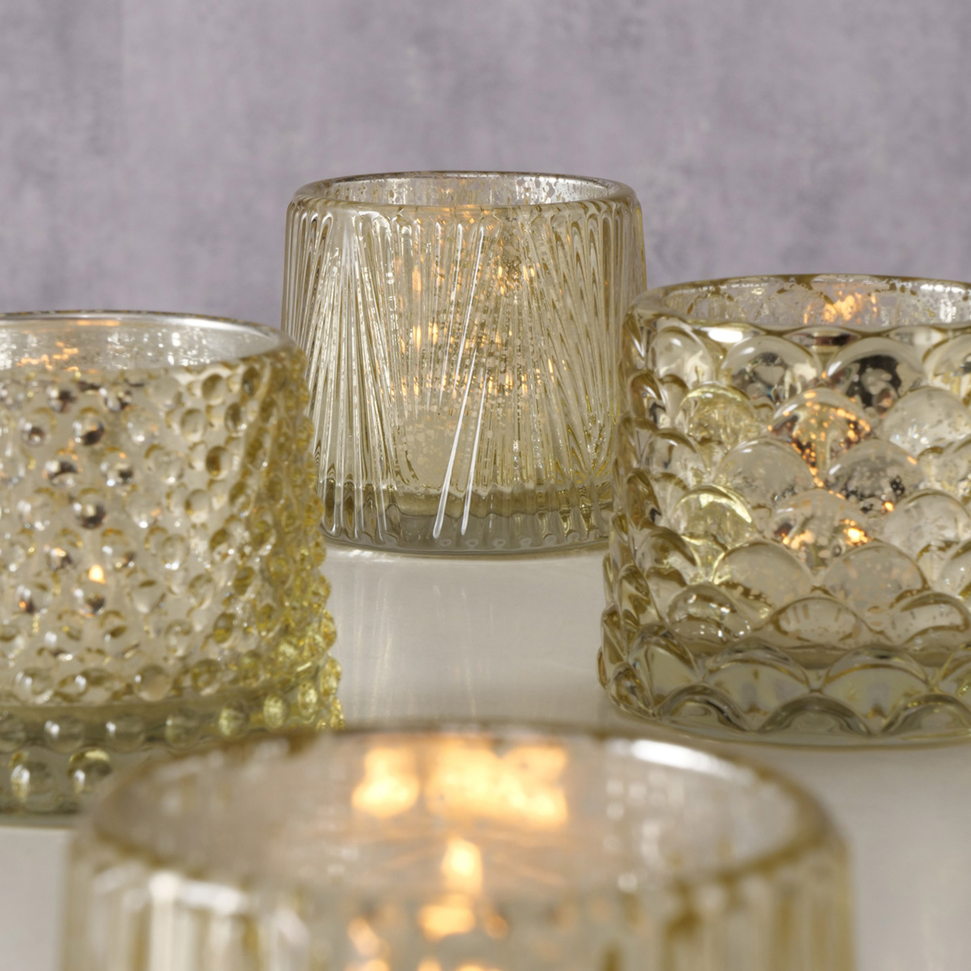 Teelichthalter - gold - sortiert - 7 cm hoch
