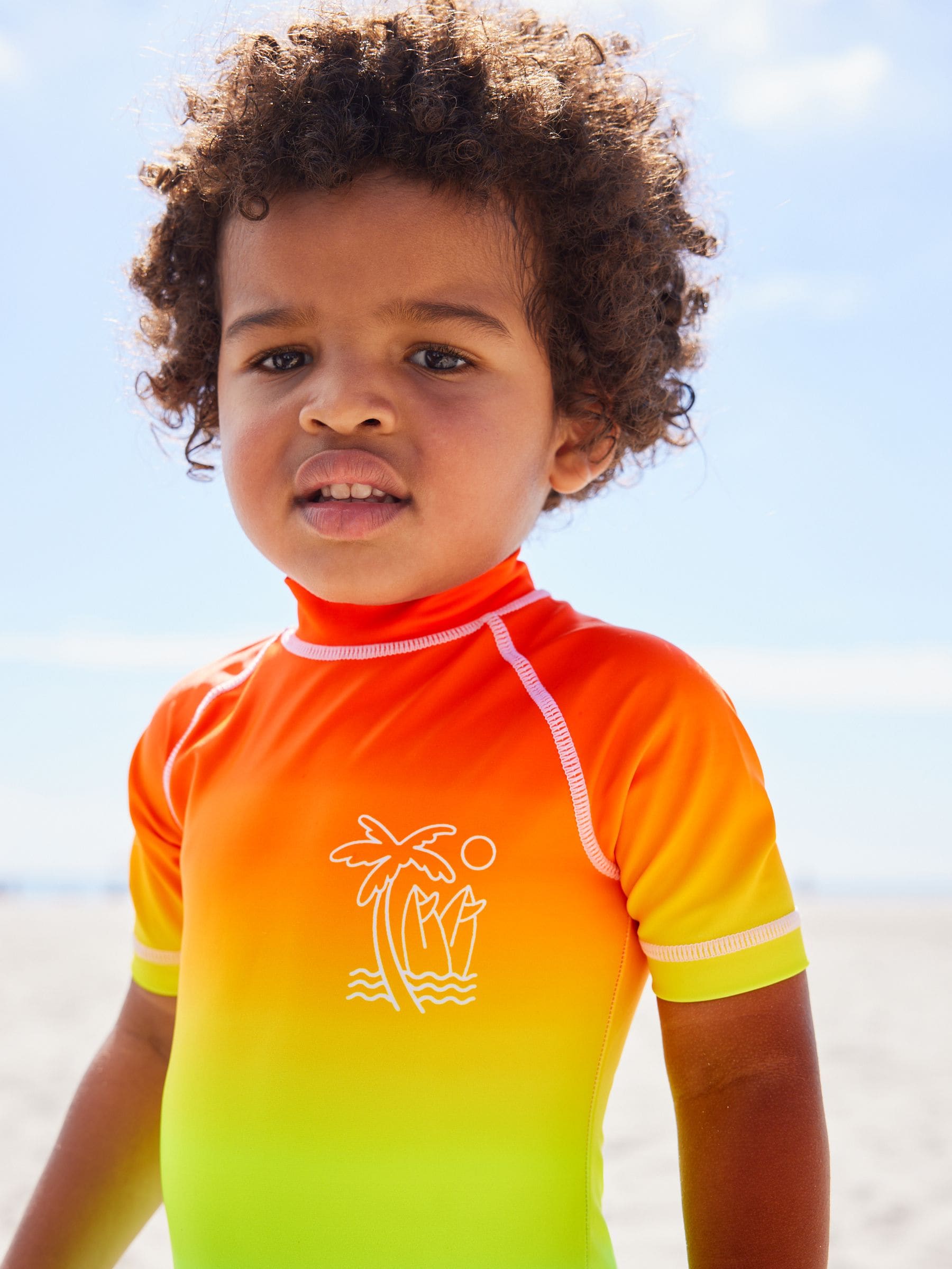 Regenboog dip-dye - Zonbeschermend onesie (3 mnd-7 jr)