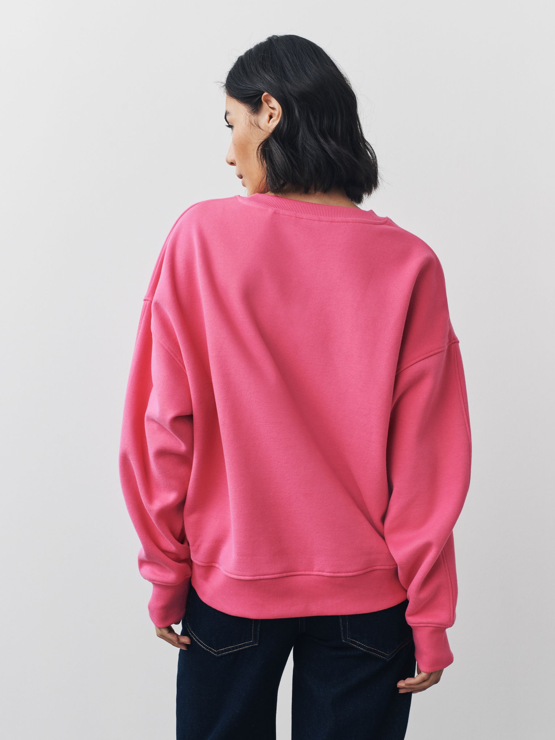 Bessenroze - Seasonal Christmas Bow Graphic With Sparkle Sequins Longsleeve Crewneck Sweatshirt