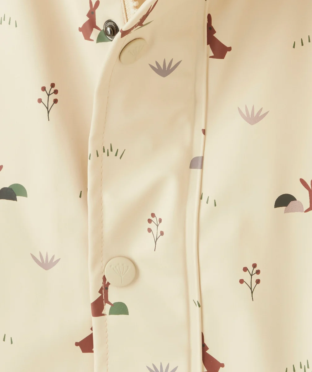FRESKIMPERMÉABLE BEIGE AVEC IMPRIMÉ LAPIN
