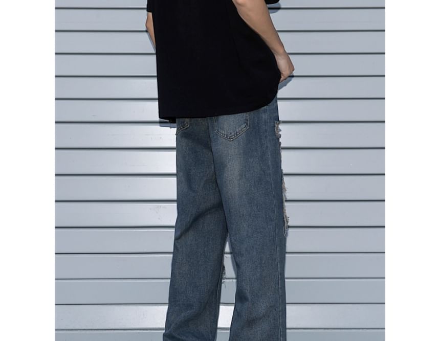 Trimecca - Hoge taille jeans met wijde pijpen en versleten look