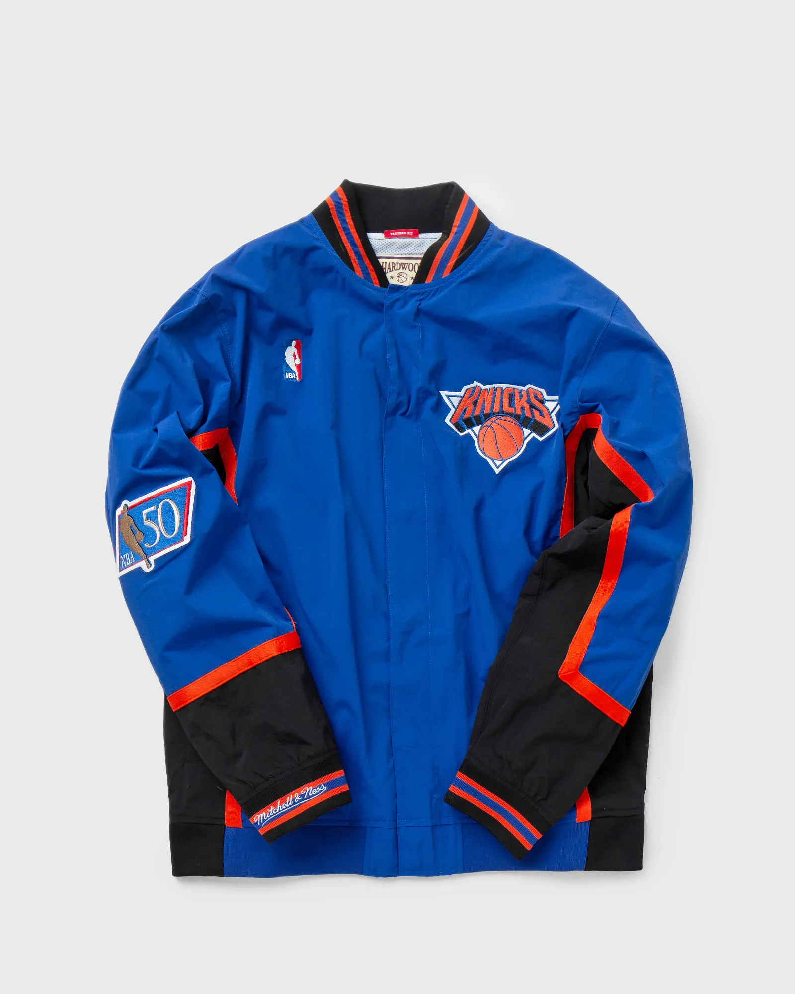 Jaqueta de aquecimento autêntica da NBA da Mitchell & Ness, New York Knicks, temporada 1996-97.