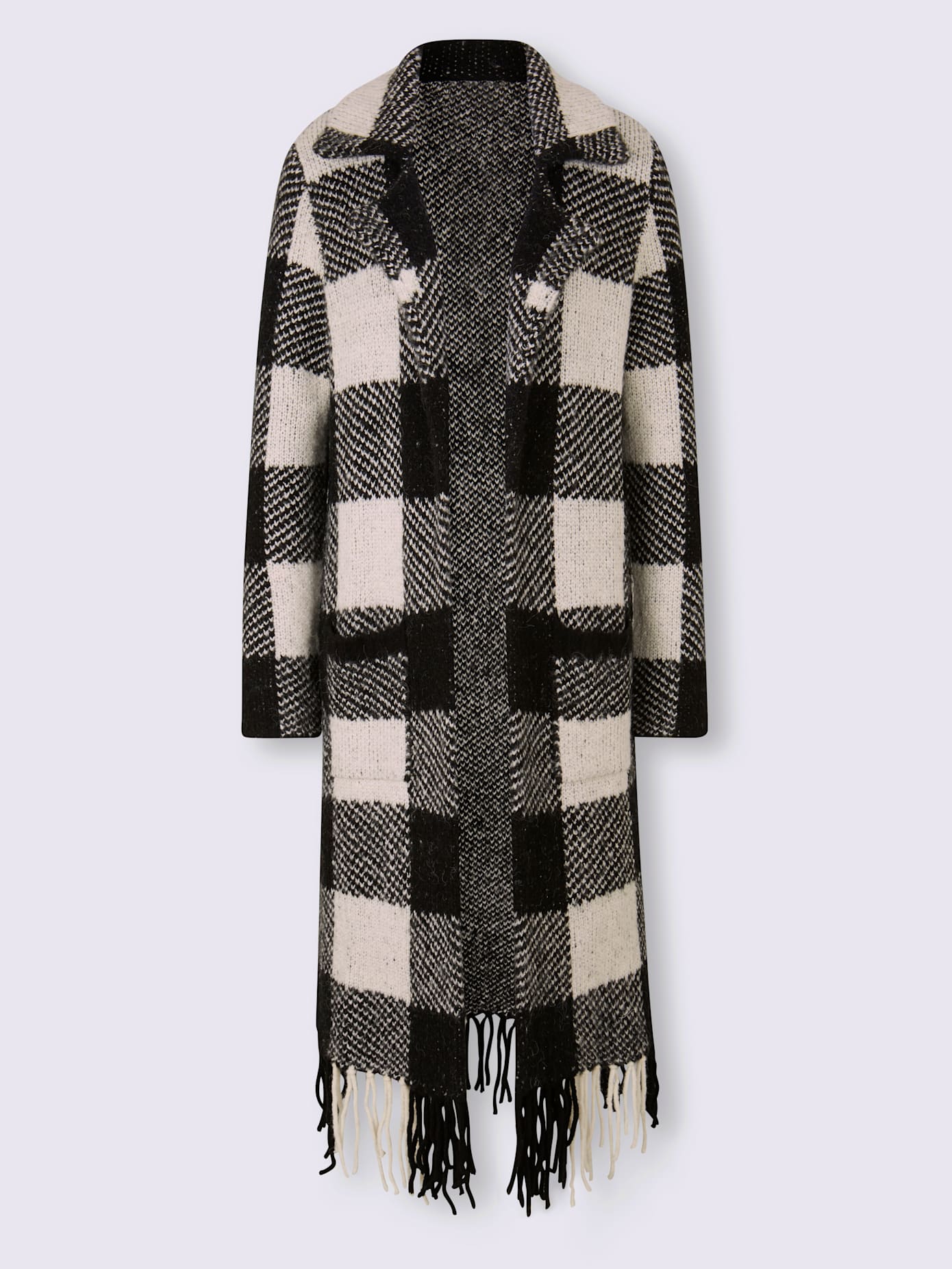 Manteau en tricot finitions arrondies à franges