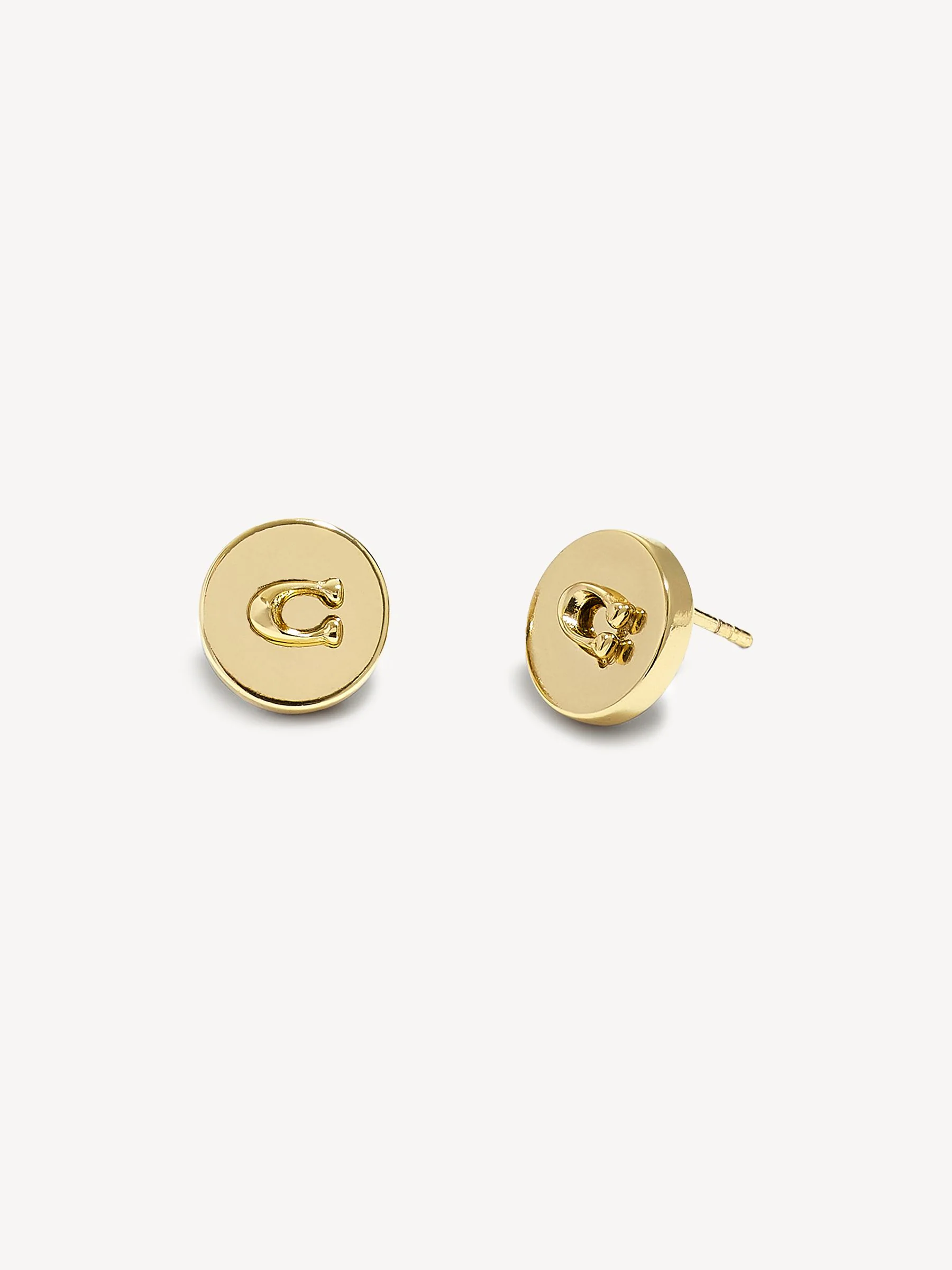 Goud - COACH Tone Signature oorknopjes met muntstuk