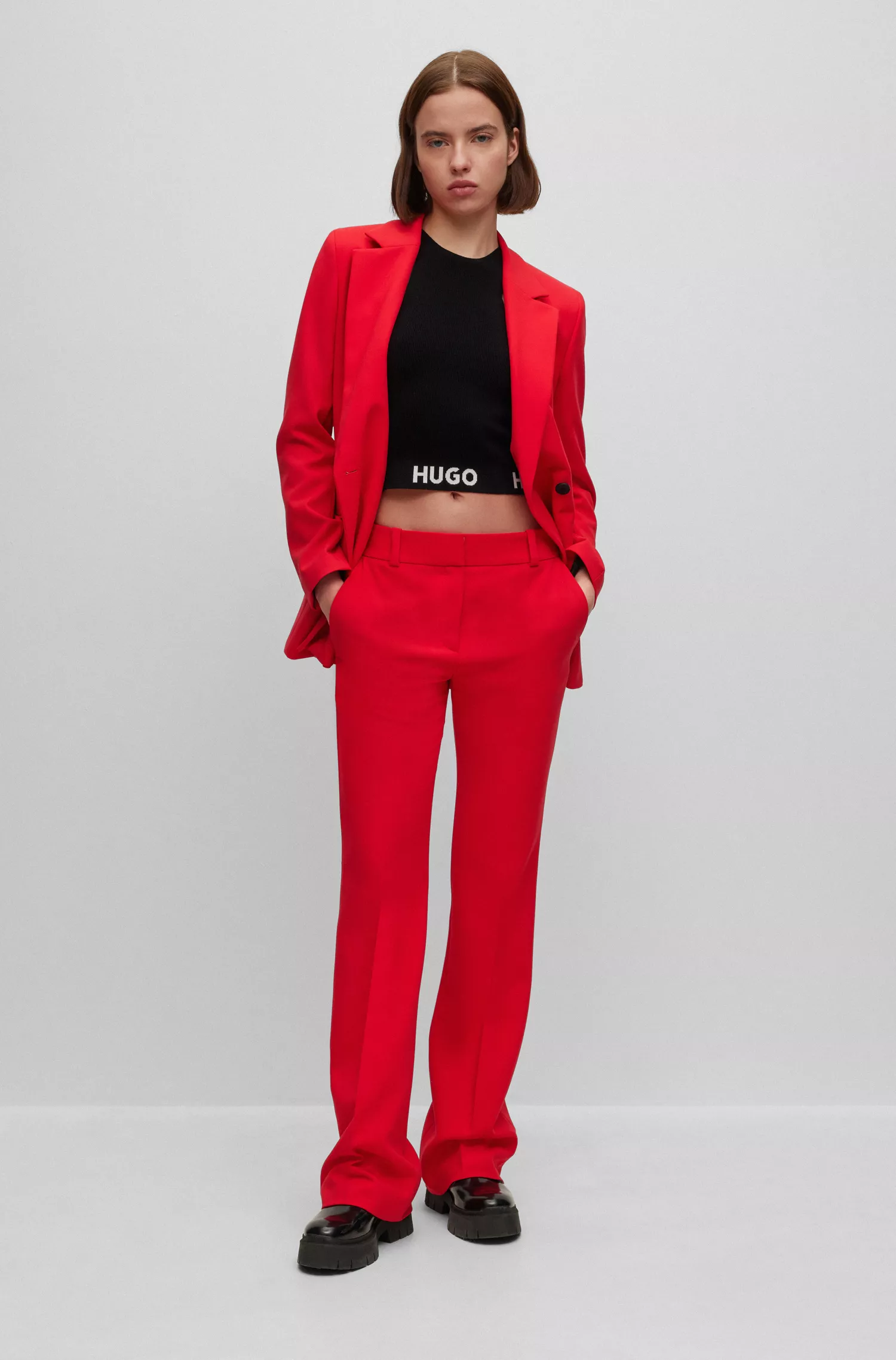 Blusa HUGO vermelha sem mangas em malha canelada com cós em jacquard com o logotipo.