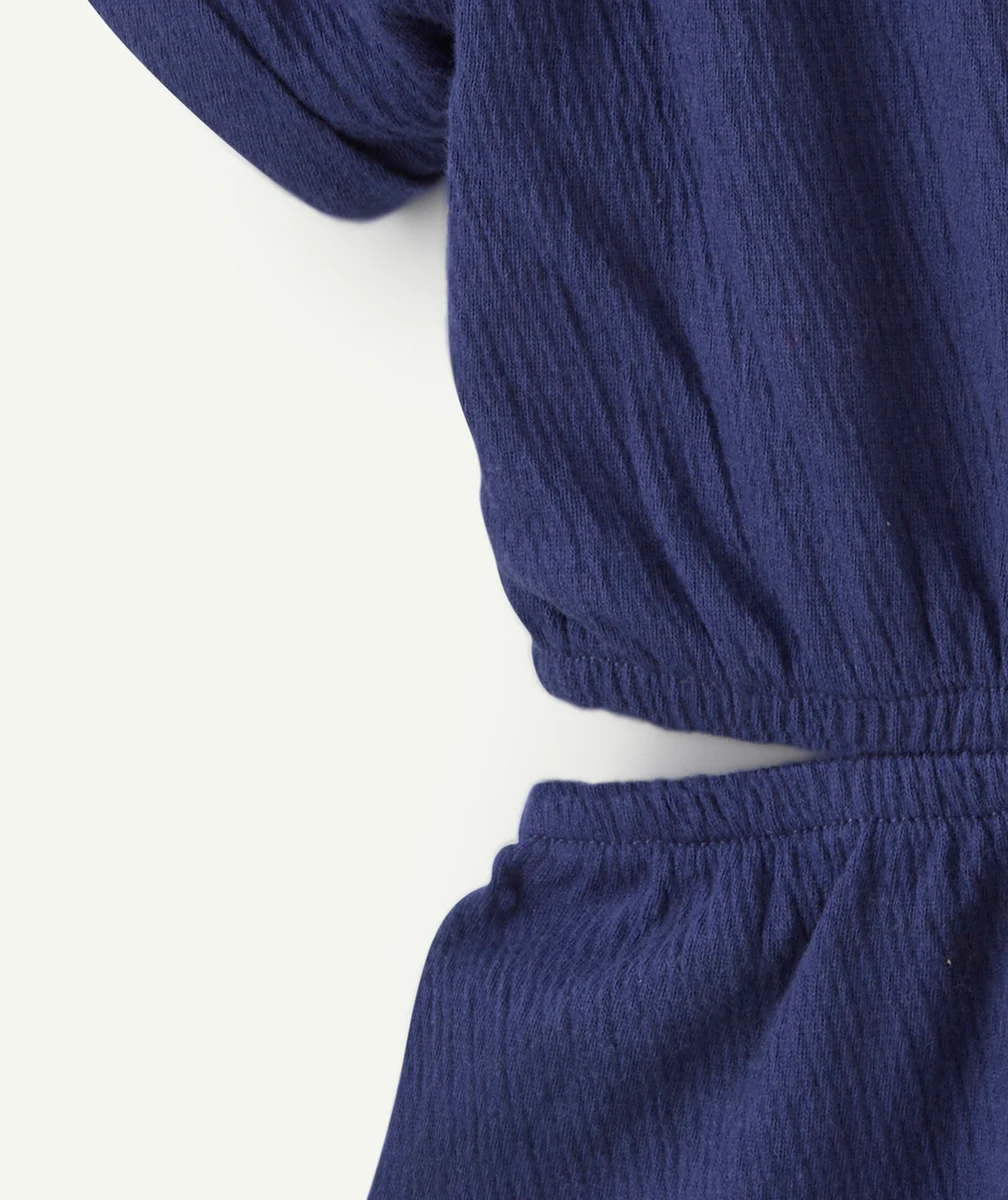COMBINAISON EN MAILLE ET FIBRES RECYCLÉES BLEU AVEC OUVERTURES