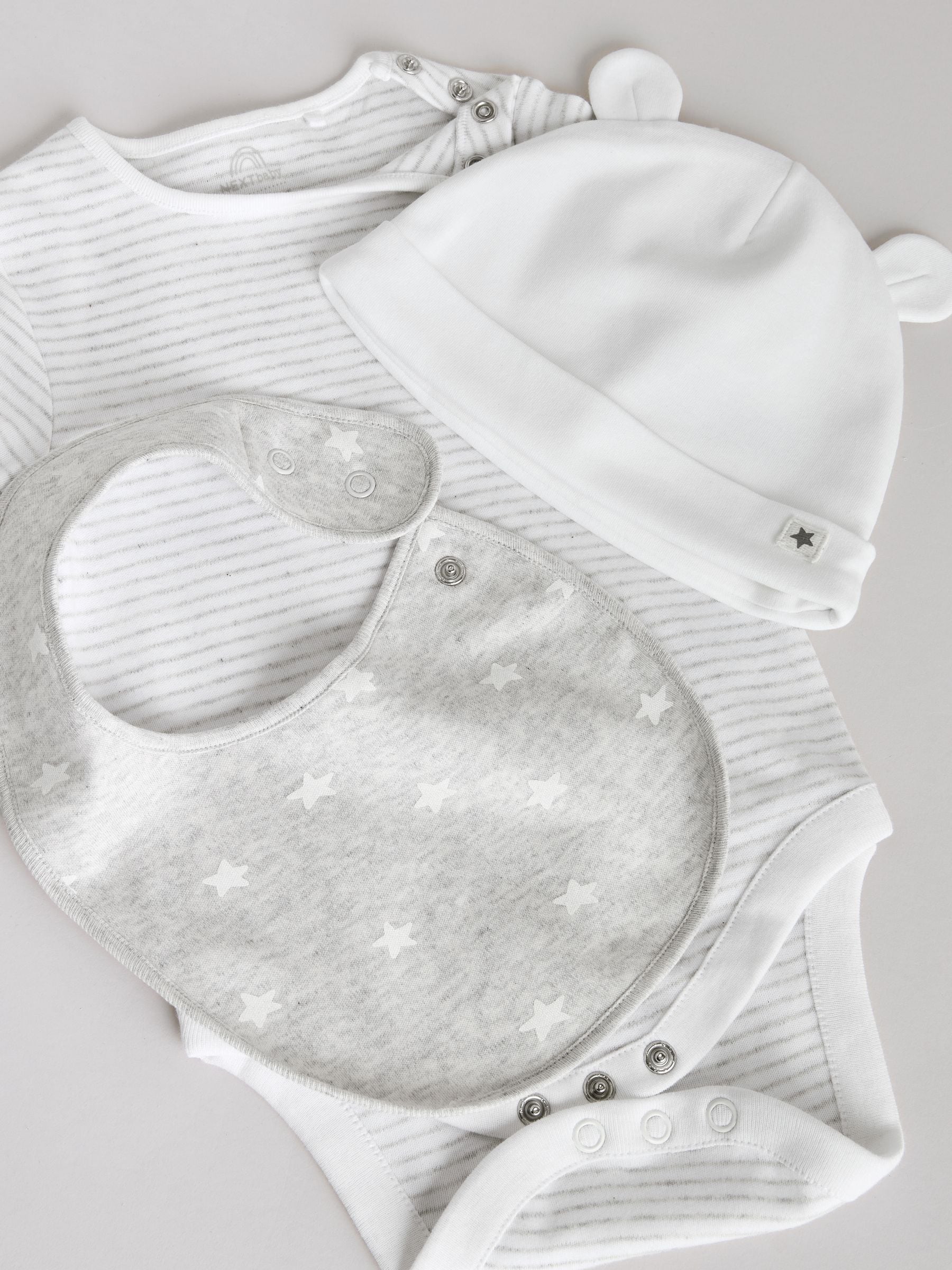 Grijs met sterren - Baby Cadeausets 7 -delig (0-18mnd)