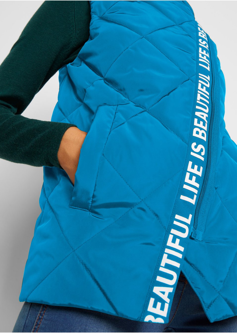 Veste matelassée sans manches asymétrique