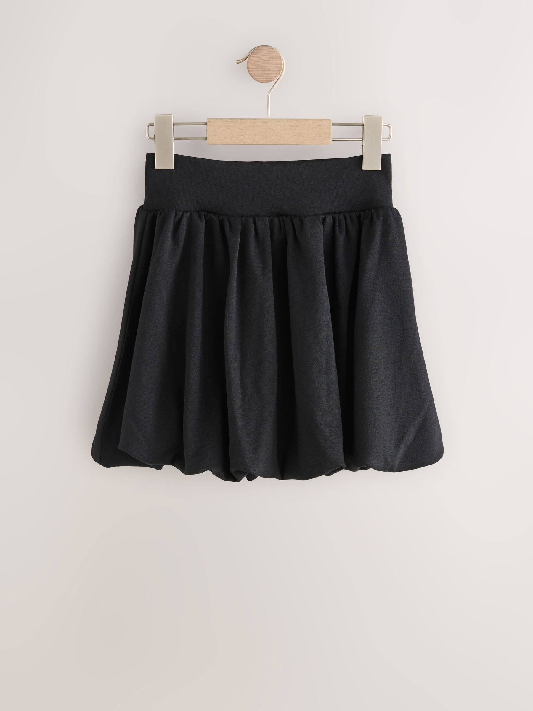 Zwart - Jersey stretch rok met ballonzoom en elastische taille (3-17jr)