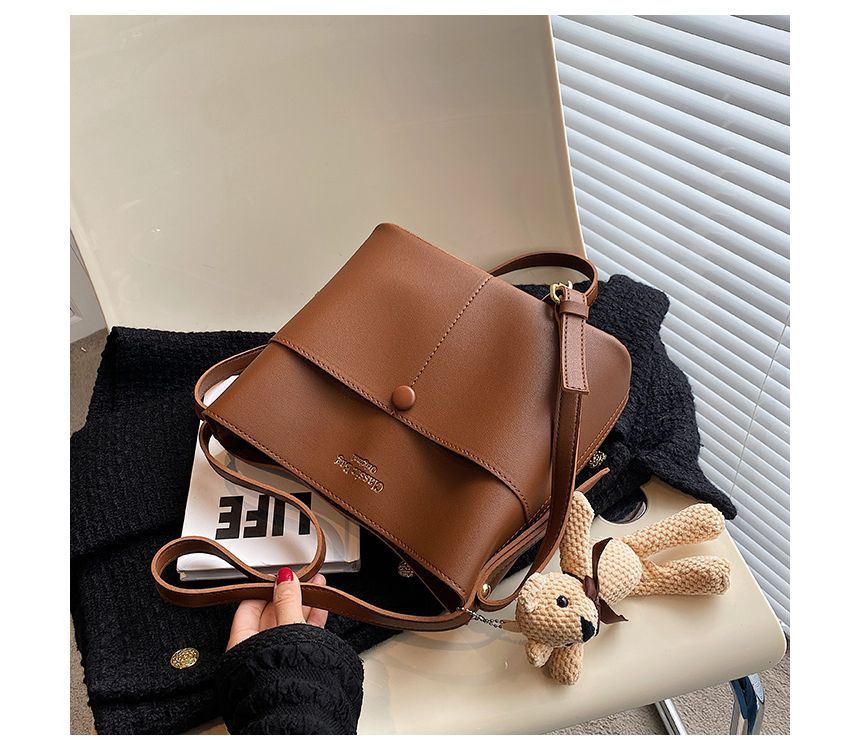 Skyglow - Kunstleren bucketbag met letters