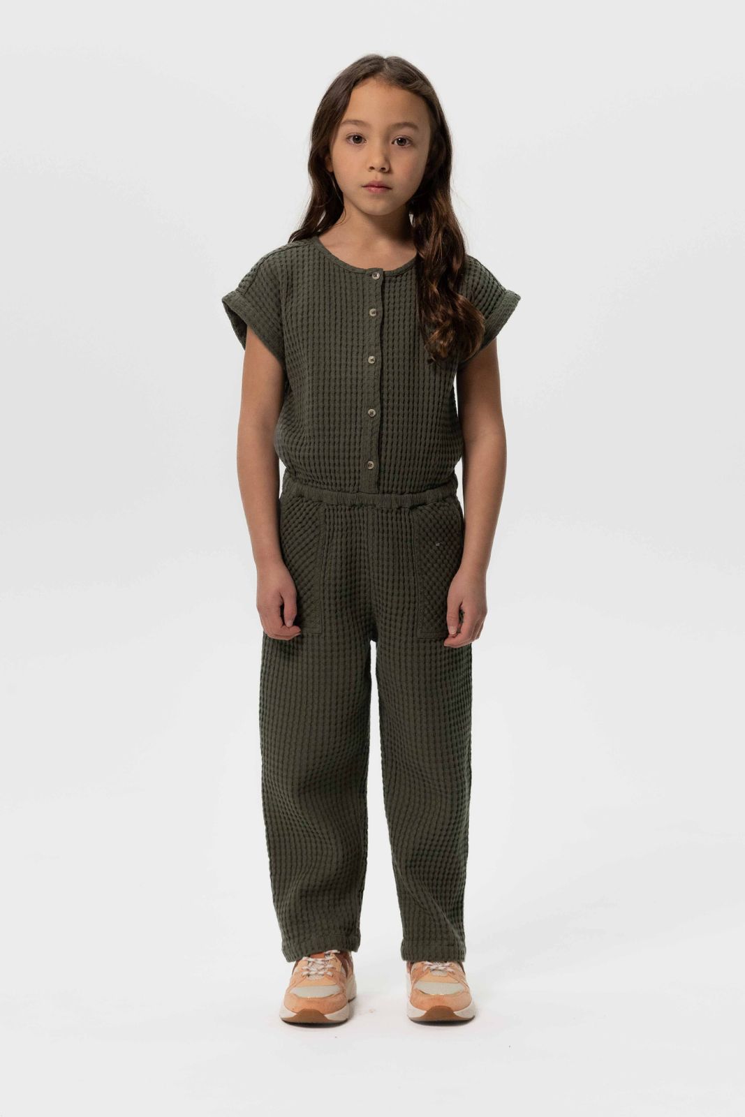 Donkergroene jumpsuit met wafelstructuur