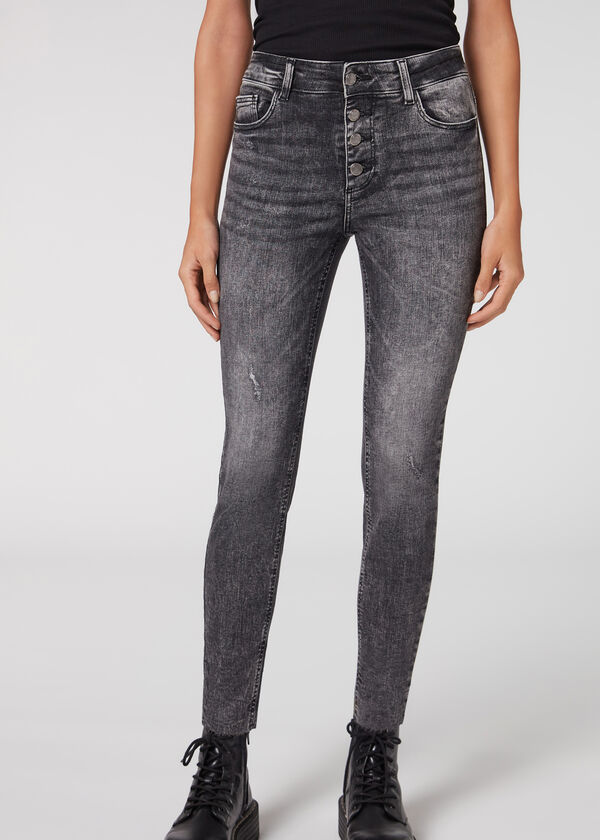 Calça jeans super skinny com botões