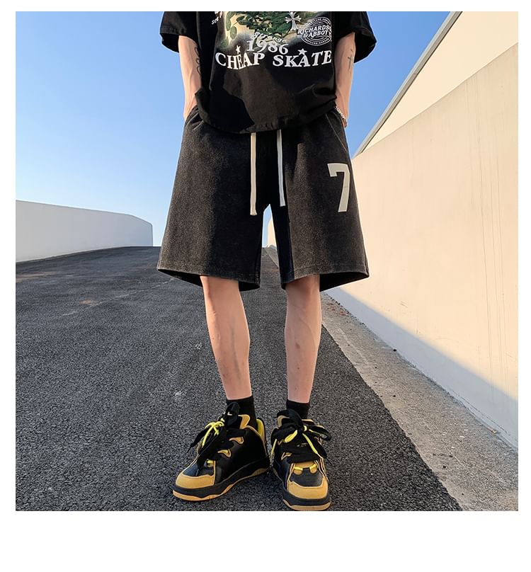 Kimeya - Gewassen sweatshorts met trekkoord en nummerprint