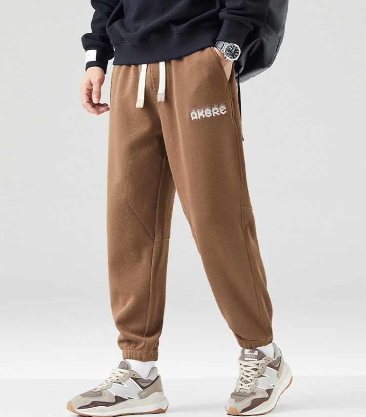 Nataro - Joggingbroek met rechte pijpen en middelhoge taille en tekst
