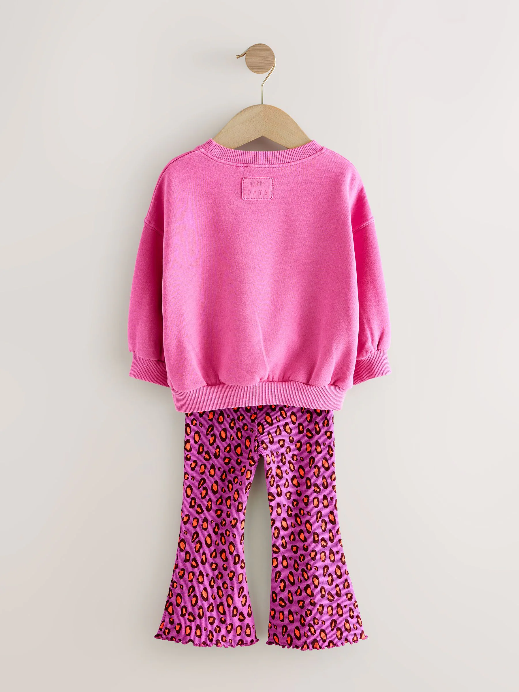 Roze dierenprint met hartjes - Set van sweatshirt en uitlopende legging (3mnd -7jr)