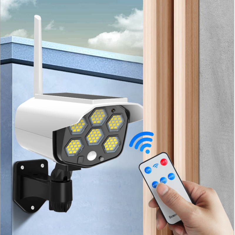 Dummy Outdoor Solar Sicherheitskamera Überwachungskamera Attrappe mit LED Beleuchtung und Fernbedienung inkl. Wandhalterung (IP66) - Weiss