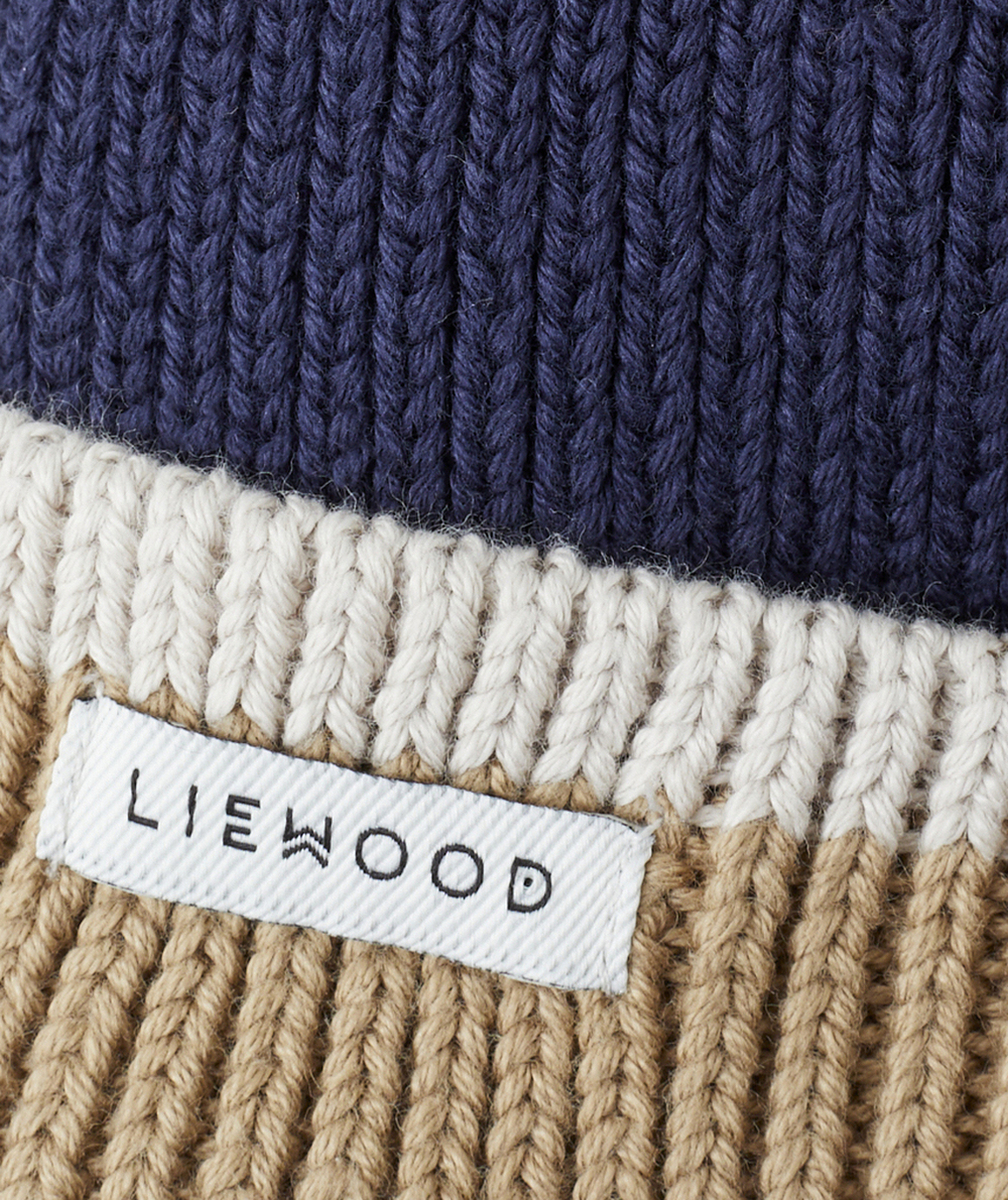 LIEWOODBONNET GINA EN TRICOT CÔTELÉ ET COTON BIO BLEU MARINE ET BEIGE AVEC OREILLES D’OURS