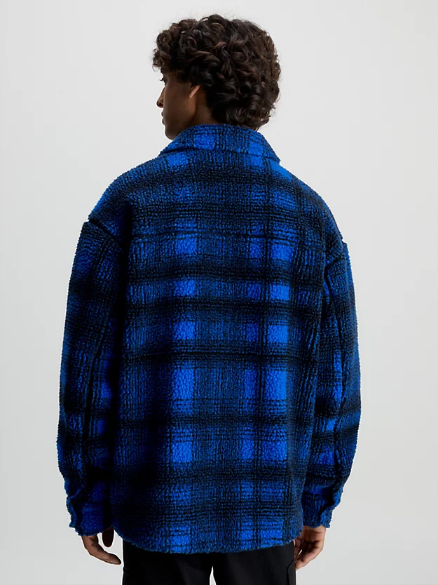 Jaqueta camisa xadrez sherpa