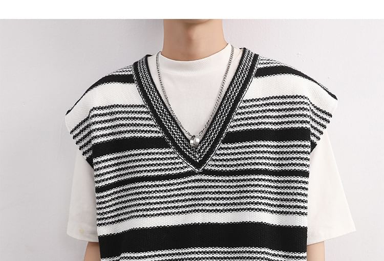 Dubbel wit - V-hals gestreept vest