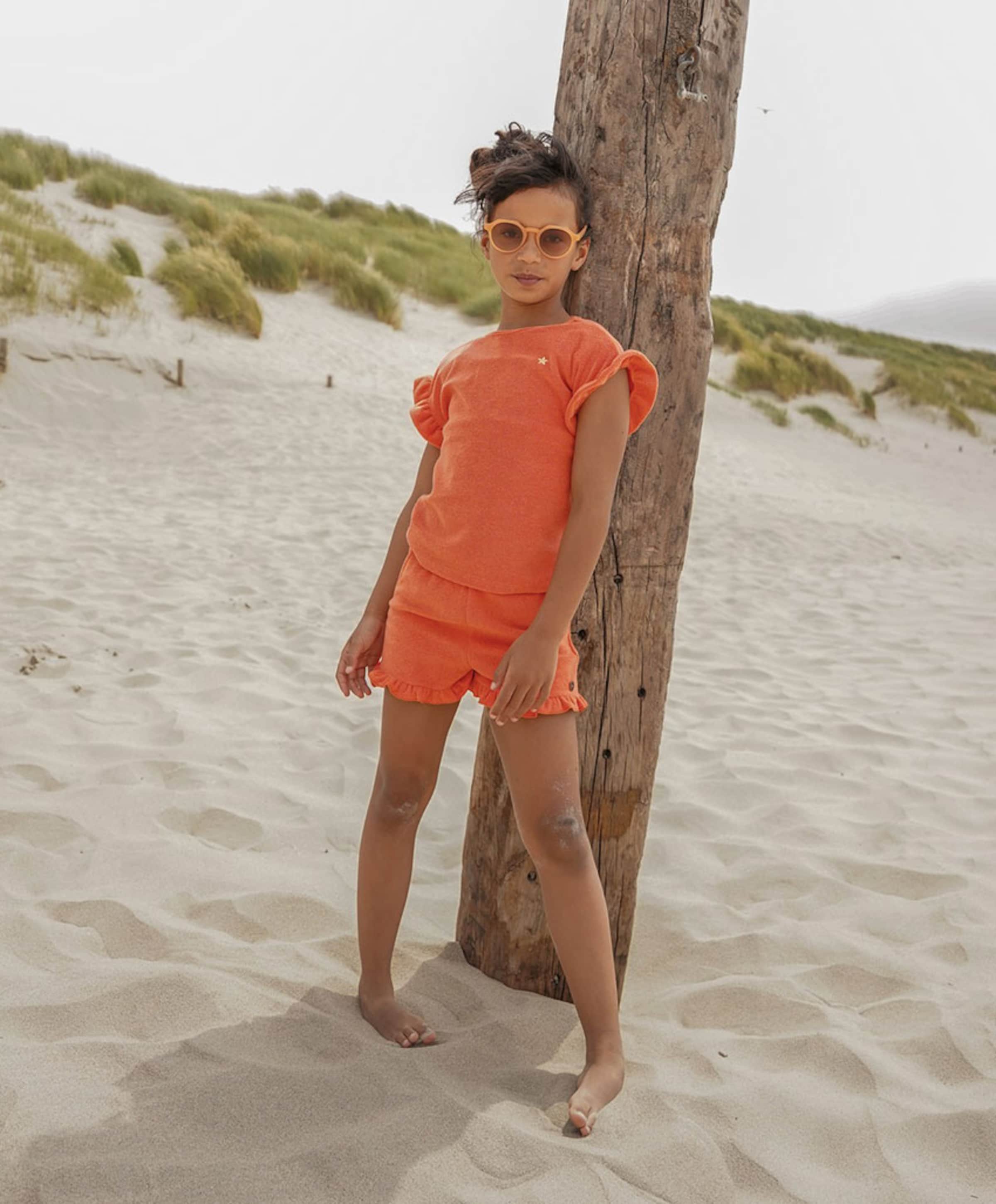 Like Flo Faje ruffle meisjes korte broek oranje