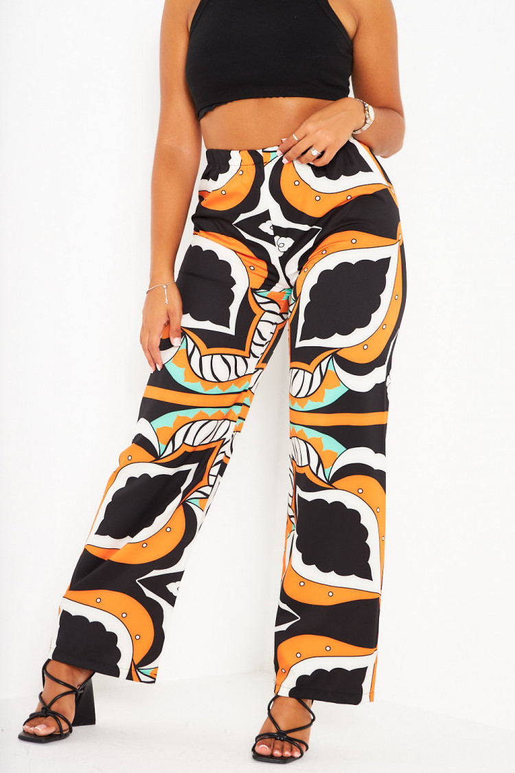 Pantalon orange large et baroque