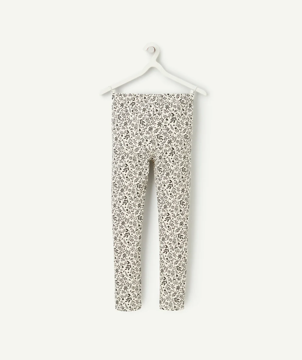legging fille en coton bio blanc avec imprimé fleurs et feuilles noir
