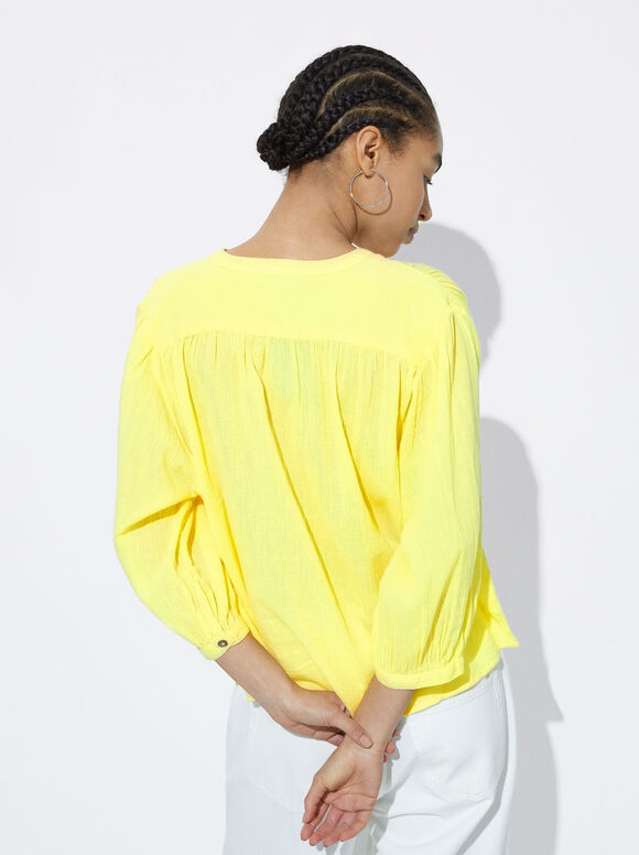 Camisa estruturada com mangas bufantes - Amarela