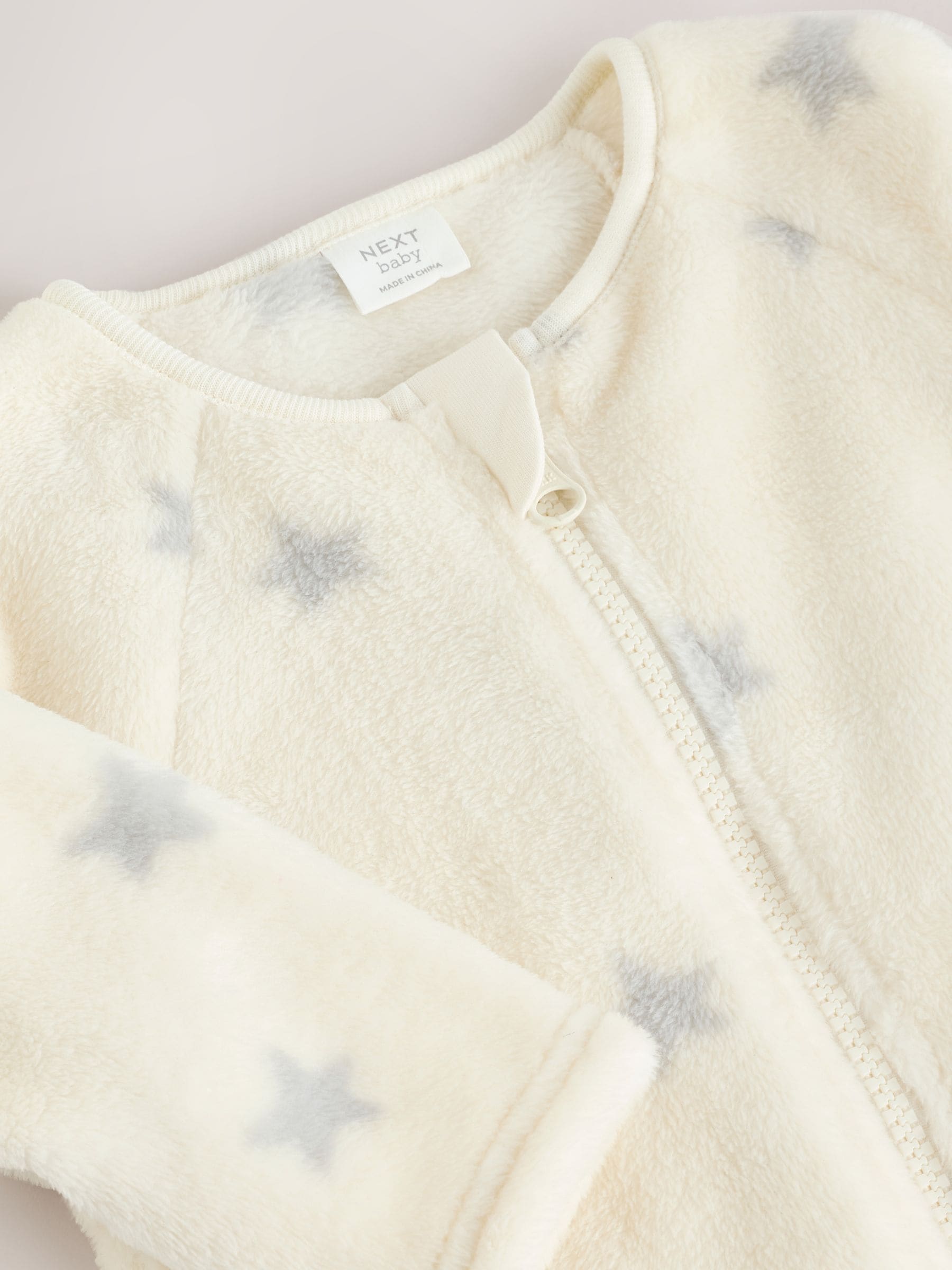 Grijs met sterren - Fleece babypyjama