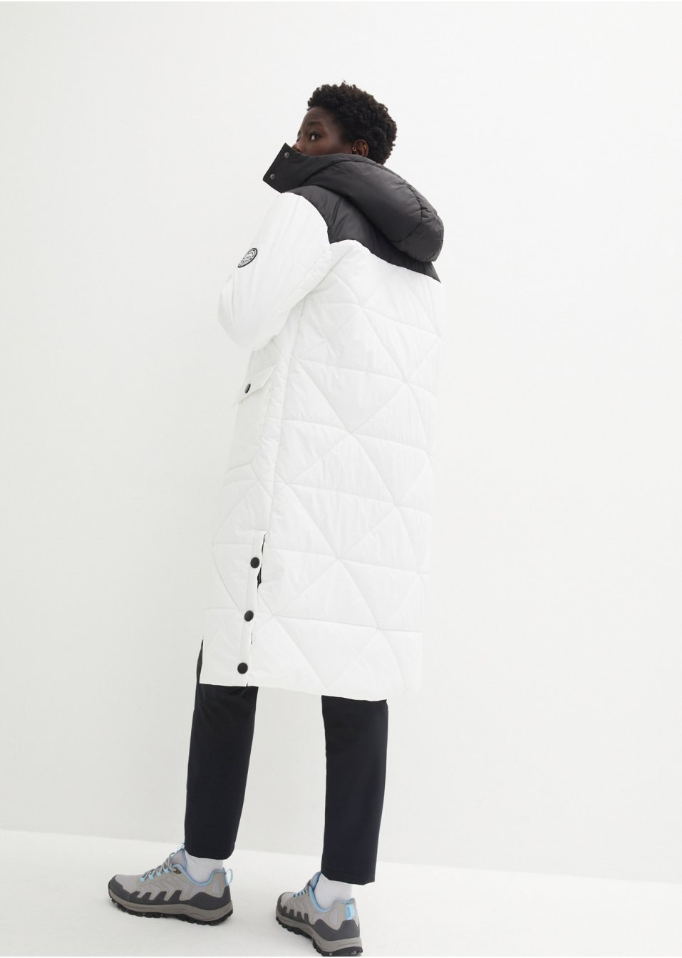 Manteau outdoor imperméable avec boutons sur le côté