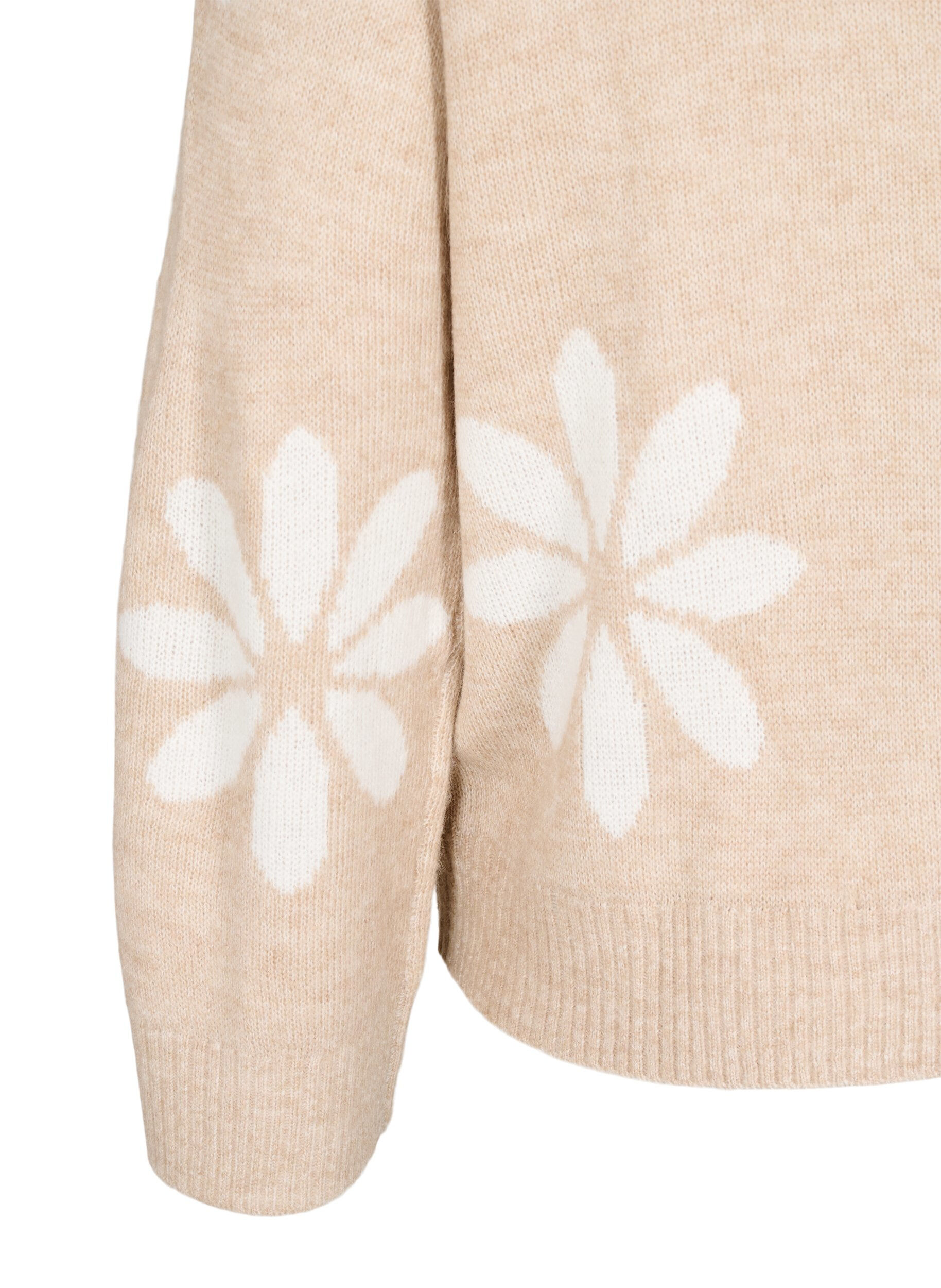 Strikbluse med blomster