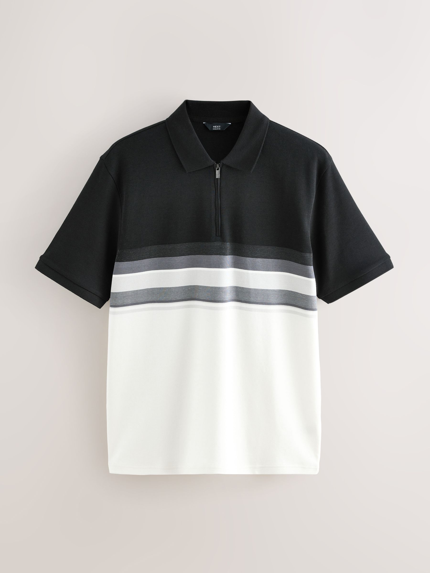 Zwart/wit - 100% katoenen poloshirt met korte mouwen, rits bij de hals en kleurvlakken