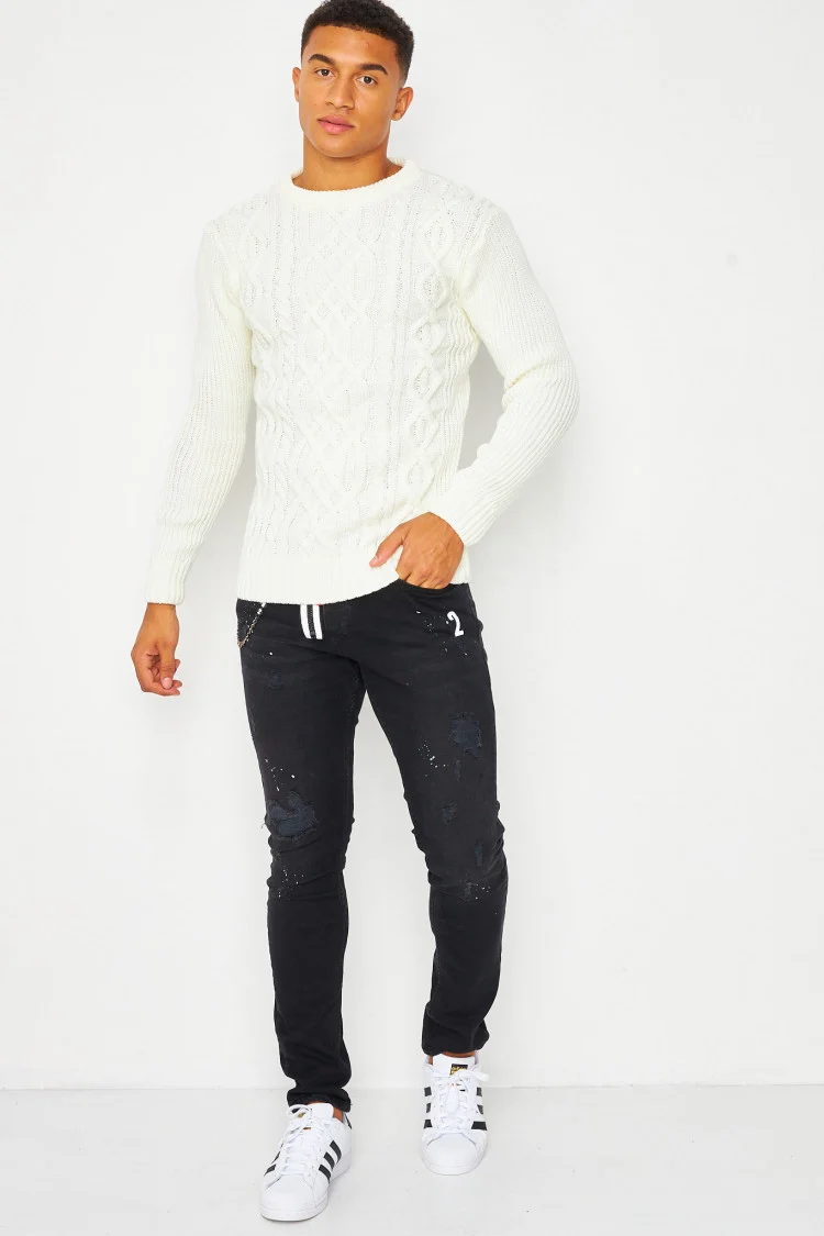 Pull blanc cassé col rond en maille torsadée