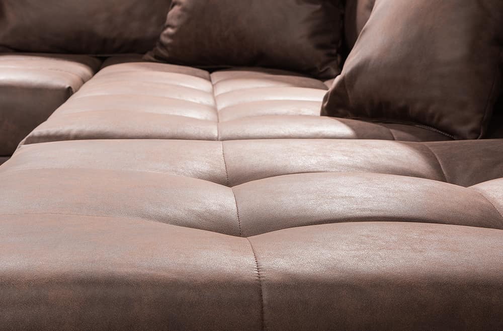 Modernes Ecksofa KENT 220cm braun Federkern Wohnlandschaft inkl. Hocker und Kissen