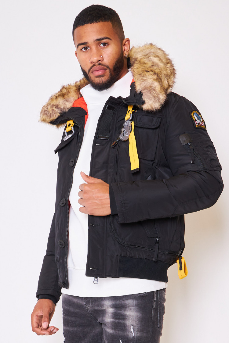 Parka courte noire multi-poches à capuche à fourrure